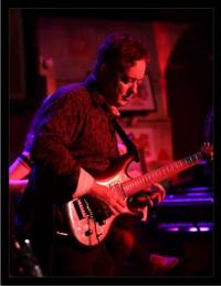 Jon Mulvey Performing with Joe Satriani 